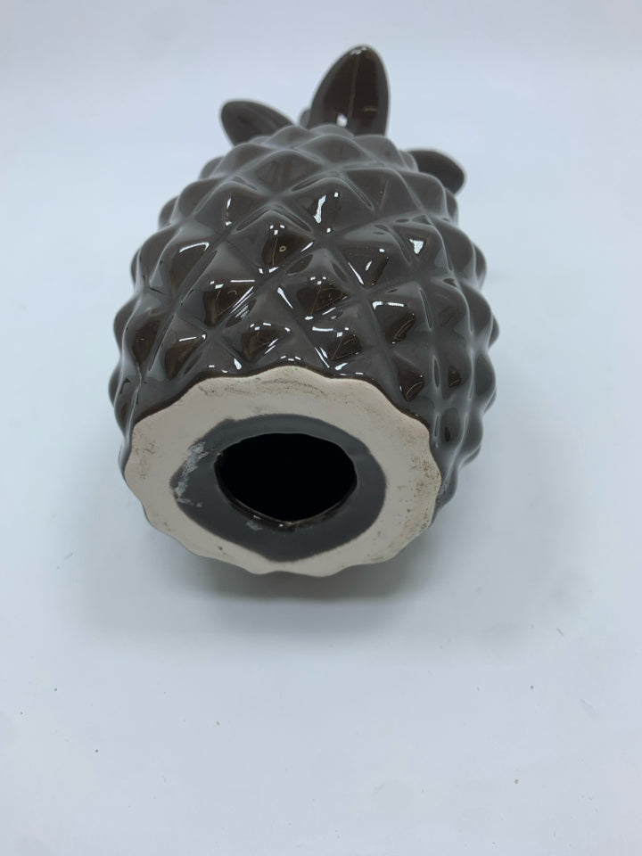 BROWN CERAMIC PINEAPPLE FIGURINE.