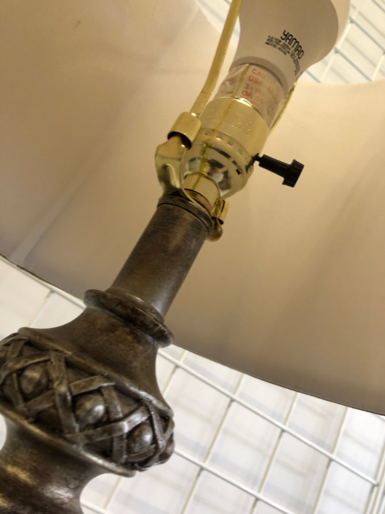 BRONZE PAINTED BASE 3WAY LAMP W/RIBBED TAN SHADE.