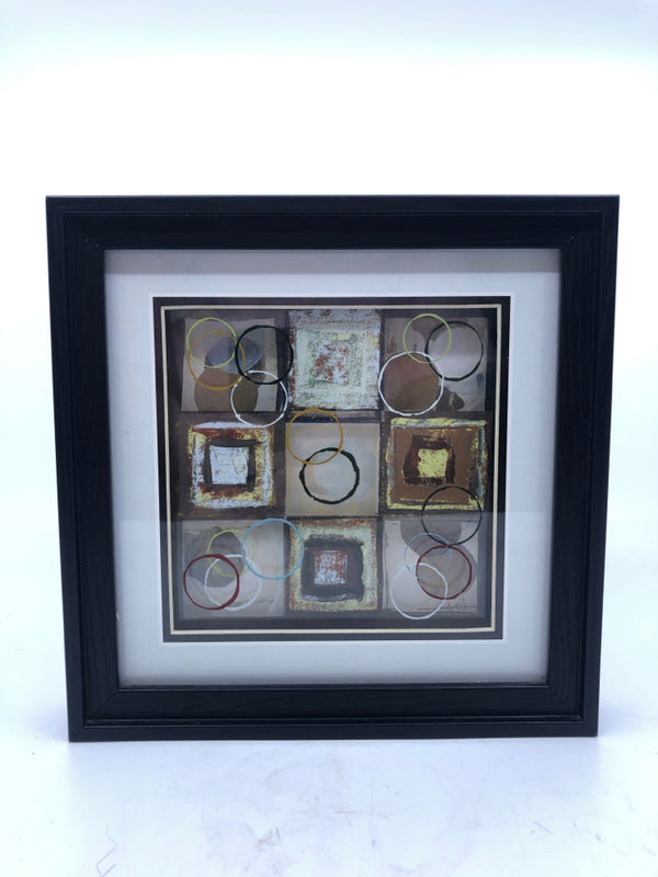 SMALL SHADOW BOX W/ ABSTRACT SQUARES/ CIRCLES ON GLASS WALL ART BLACK FRAME.