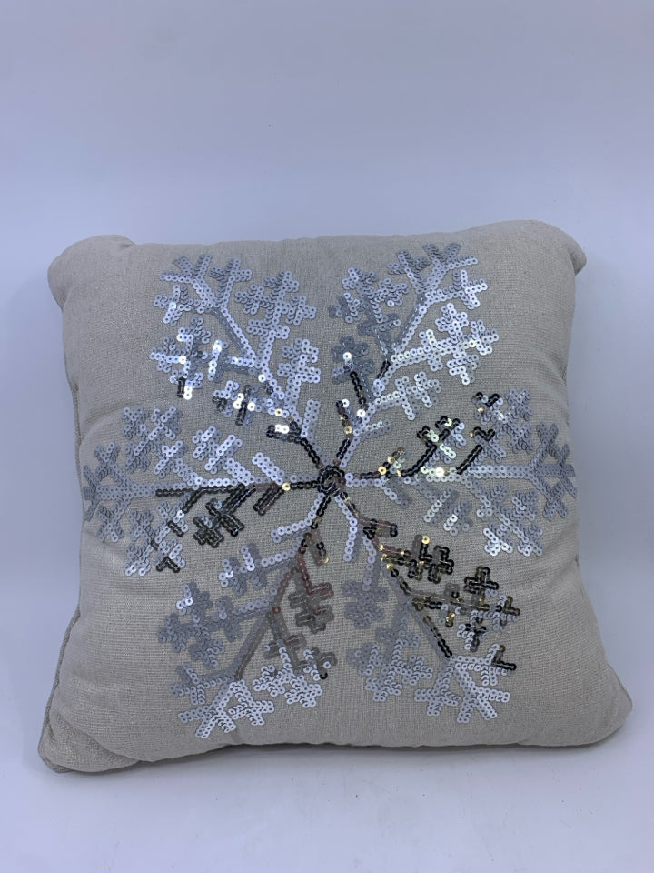 CREAM SPARKLE PILLOW W/ SEQUENCE SNOWFLAKE PILLOW.