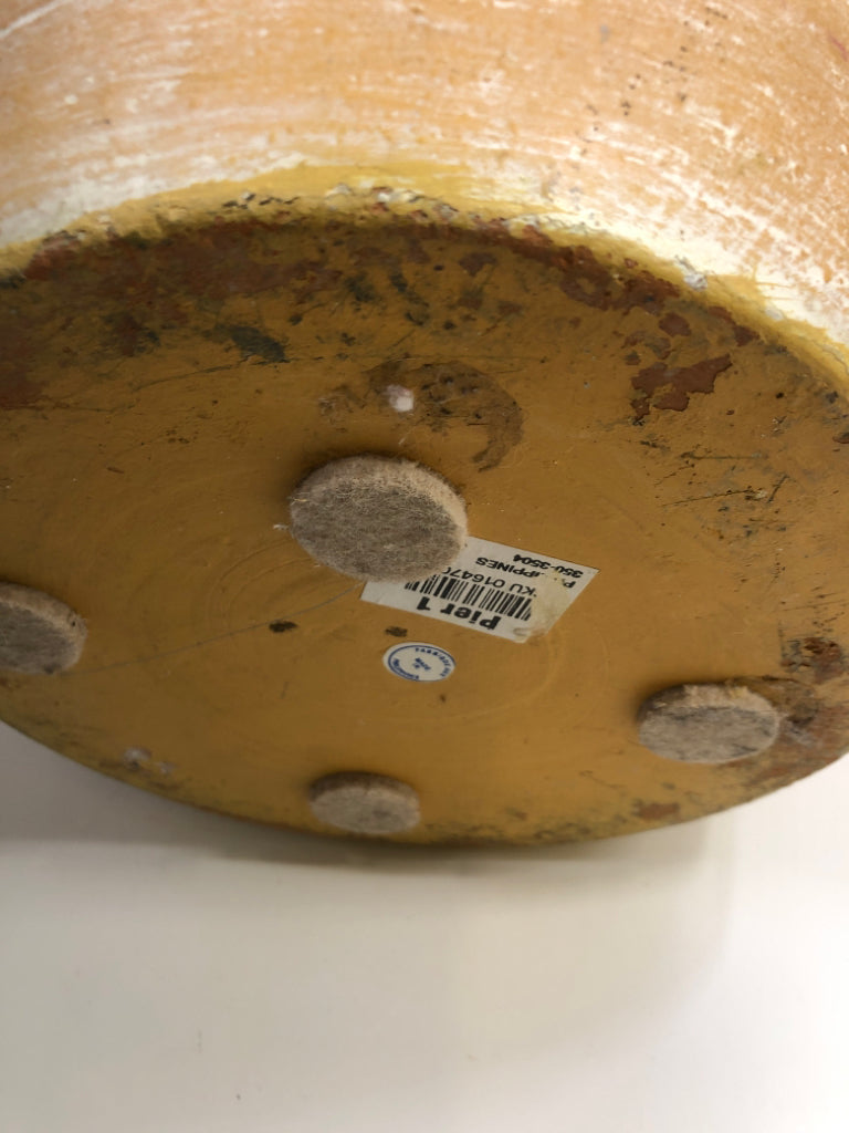 CLAY JUG SHAPED VASE W/WHITE CARVED FLOWERS.