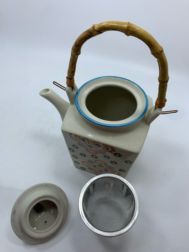TEA POT W/FLORAL MEDALLION DESIGN+BAMBOO HANDLE.