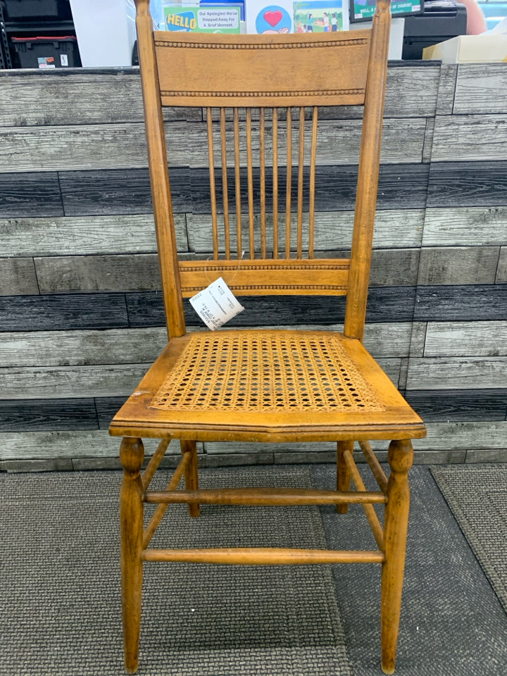 VTG WOOD ACCENT CHAIR W WOVEN SEAT.