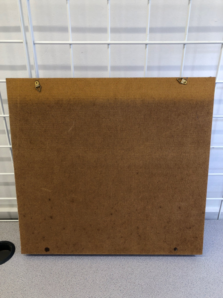 BLUE WALL HANGING W RED SHELVES.