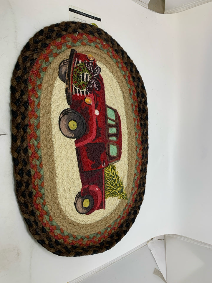 NWT SMALL OVAL BRAIDED RUG W/ PAINTED RED TRUCK EARTH RUNGS.