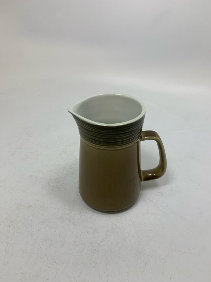 FADED BROWN CREAMER.