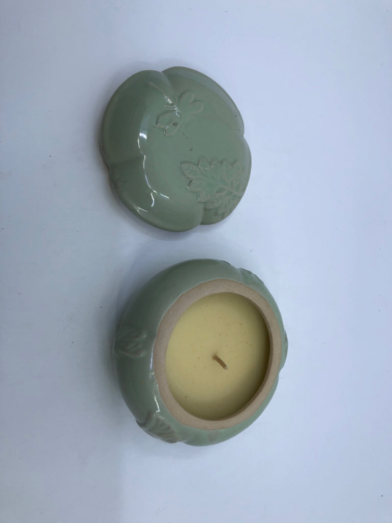 ROUND GREEN CANDLE W EMBOSSED DRAGONFLIES.