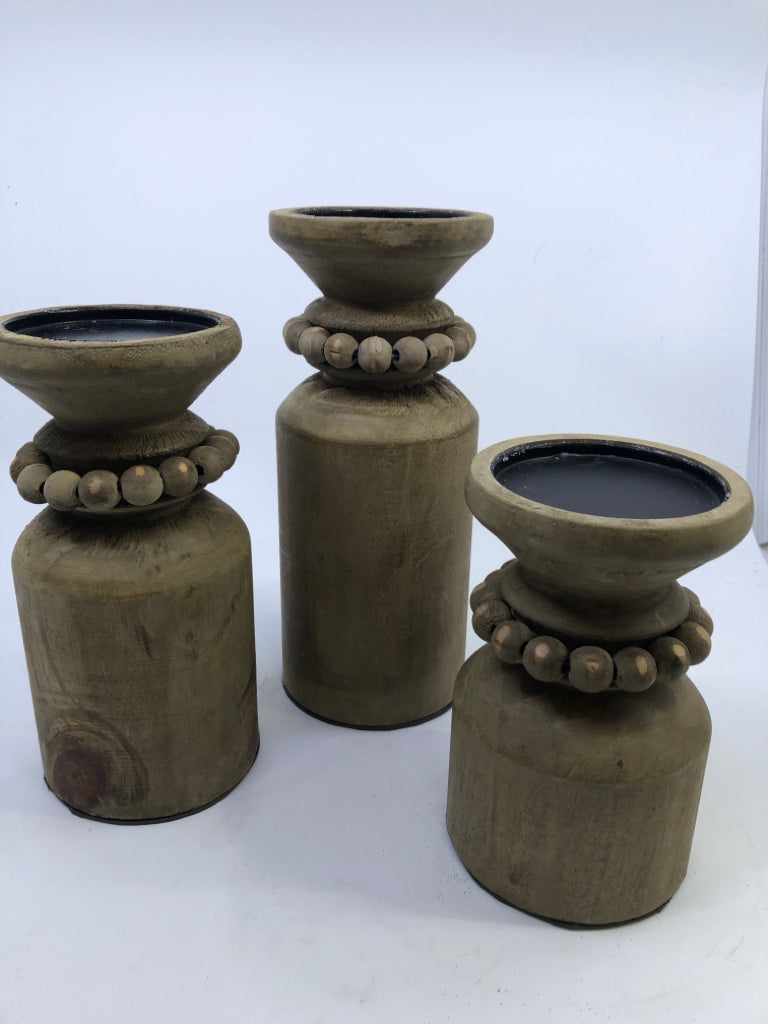 3 WOOD PILLAR CANDLE HOLDERS W/ BEADED NECK.