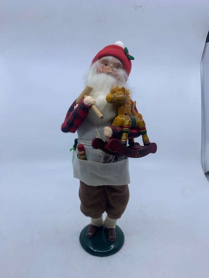 1992 BYERS CHOICE SANTA WORKING ON TOYS.