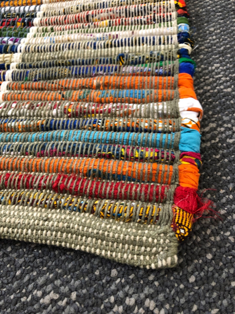 COLORFUL WOVEN RUNNER RUG.