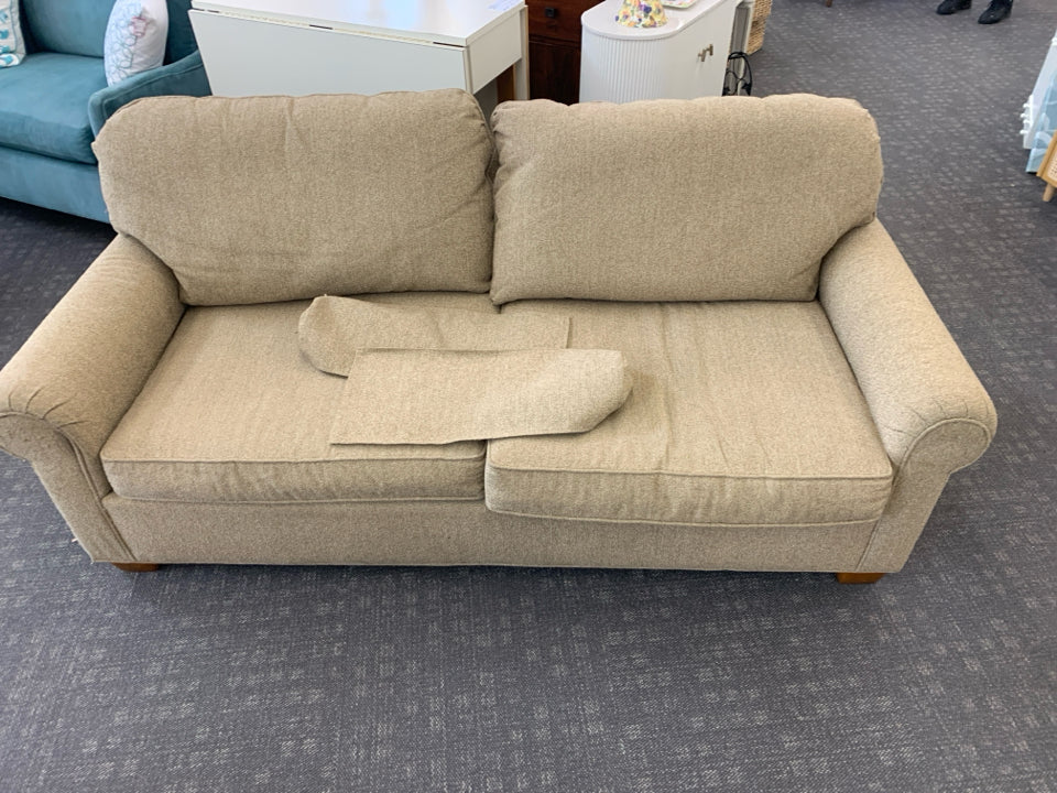 TAN LOVE SEAT.