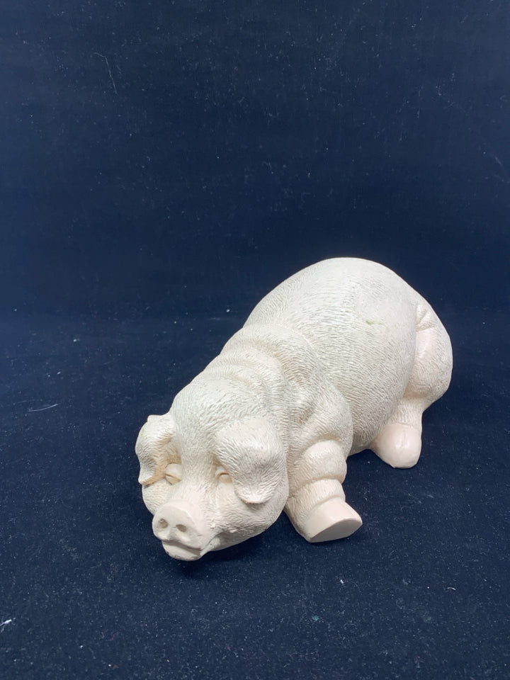 RESIN LAYING PIG.