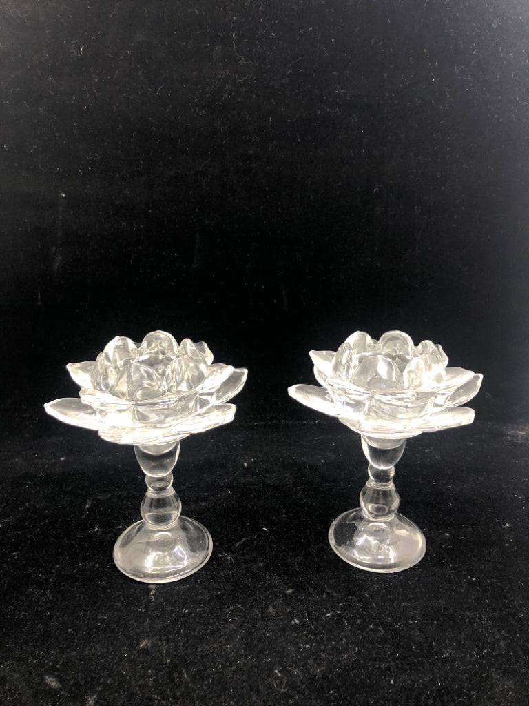 2 GLASS LOTUS TAPERED CANDLE HOLDERS.