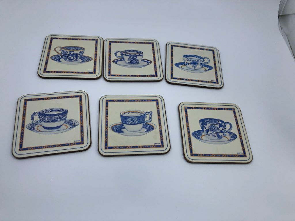 6 BLUE TEACUP PATTERN COASTERS IN BOX.