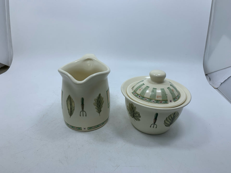 2 PC CREAMER/SUGAR BOWL GARDEN THEMED.