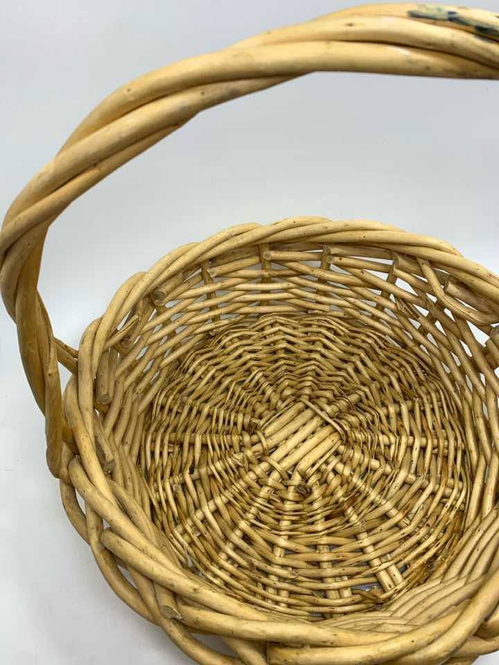 THICK WOVEN WICKER BASKET.