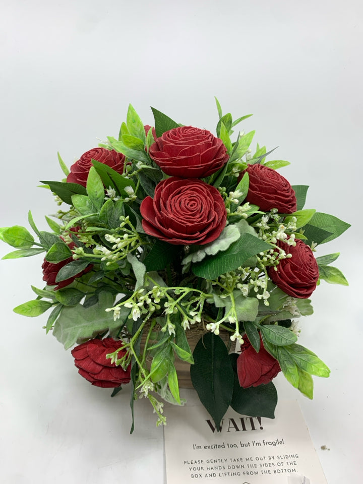 FAUX WOOD FLOWERS WITH TAG IN DISTRESSED WOOD POT.
