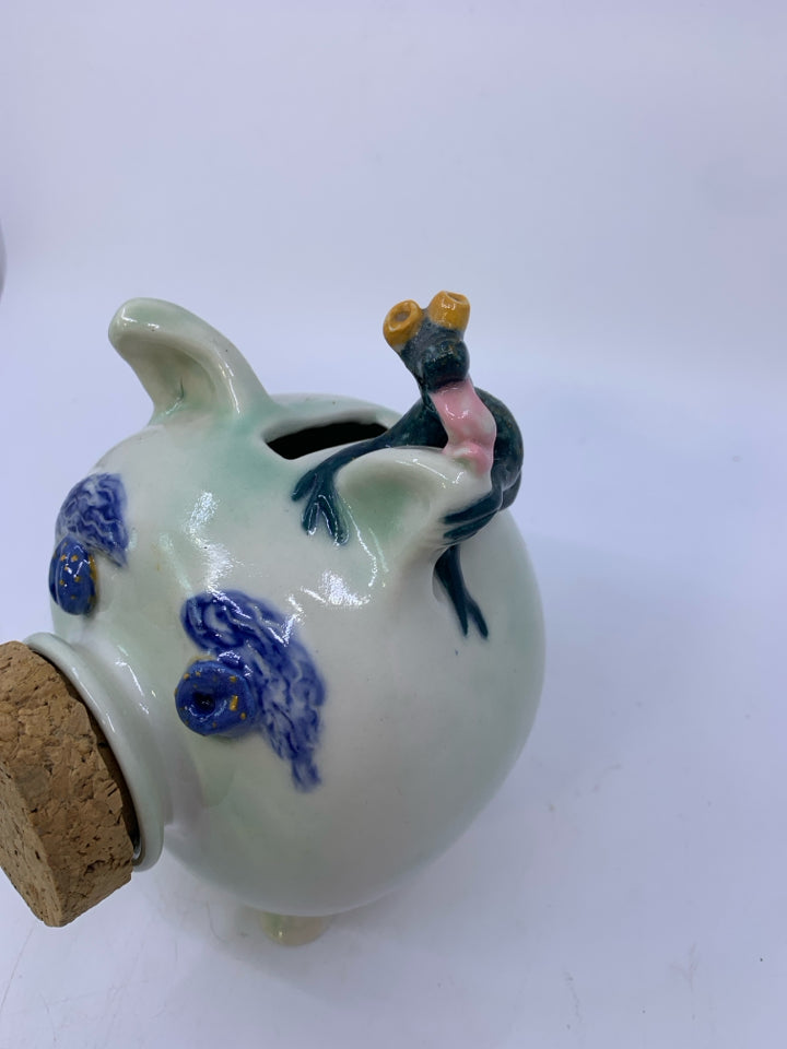 MINT GREEN POTTERY PIGGY BANK W/ CORK NOSE/ FROG LICKING EAR.