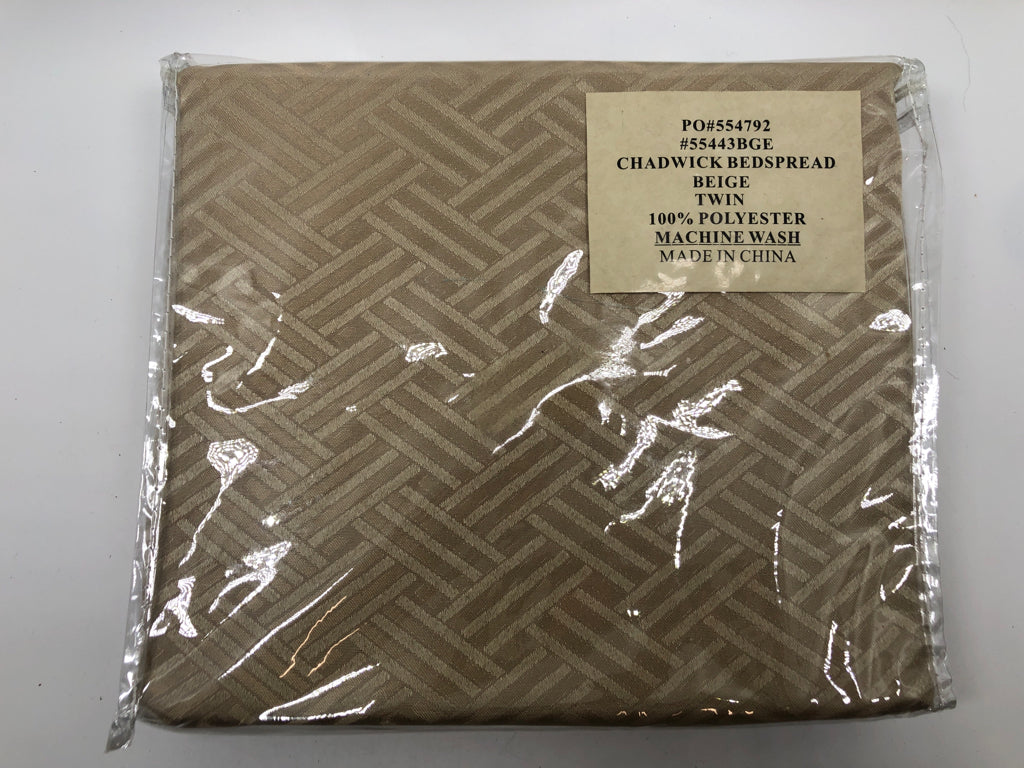 NIP BEIGE BEDSPREAD.