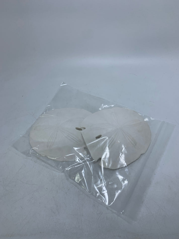 2 LARGE SAND DOLLARS IN BAG.