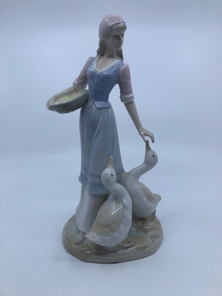 GIRL FEEDING GEESE PORCELAIN FIGURINE.