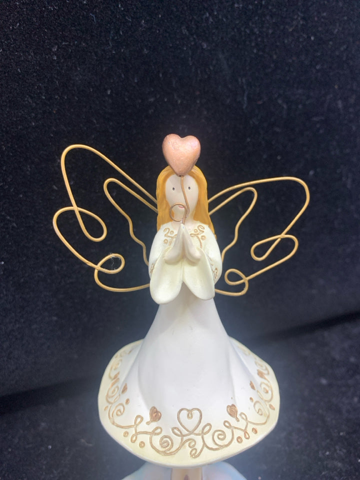 ANGEL BOBBLE HOLDING A HEART BALLOON.