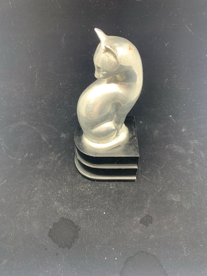 HEAVY SILVER METAL CAT ON BLACK STAND.