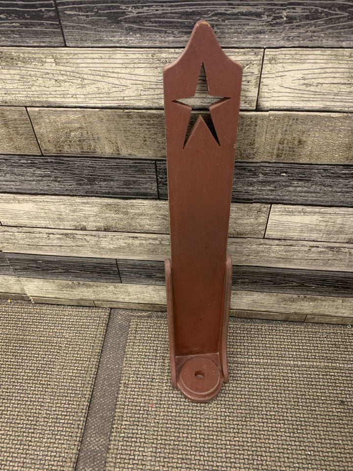 RED PRIMITIVE CANDLE HOLDER W STAR CUT OUT.