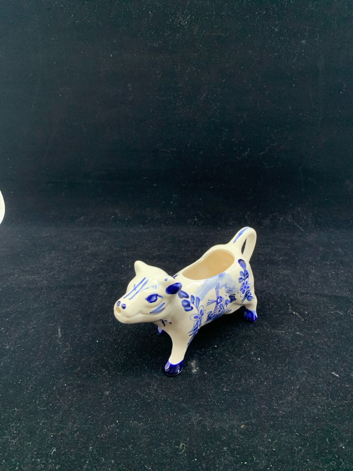 BLUE AND WHITE WINDMILL PATTERN COW CREAMER.