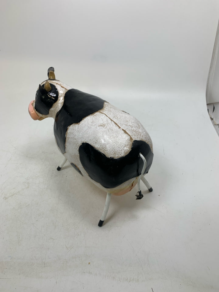 RESIN COW W/ METAL ACCENTS.