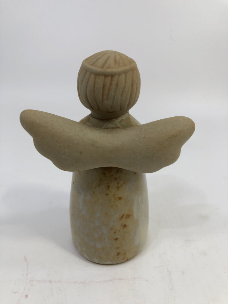 CERAMIC ANGEL WITH STAR FIGURINE.