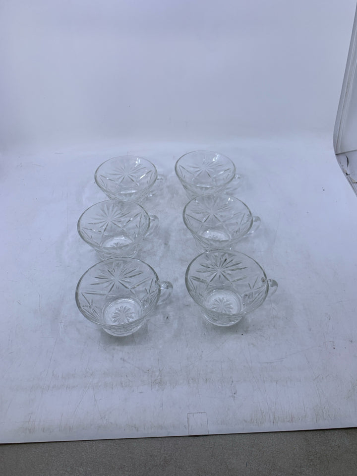 6 SHORT GLASS CUPS W/ STAR PATTERN.