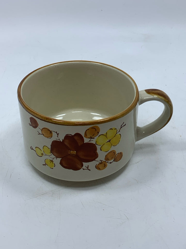 VTG TAN FLORAL MUG.