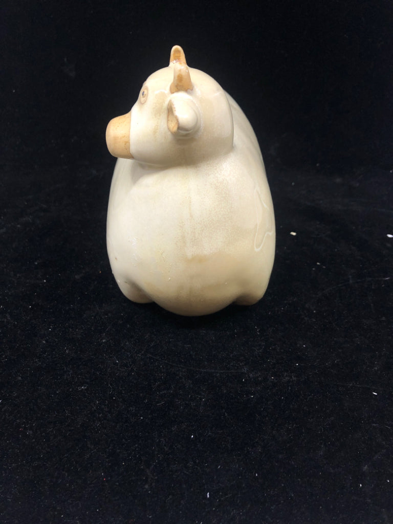 TAN CERAMIC COW.