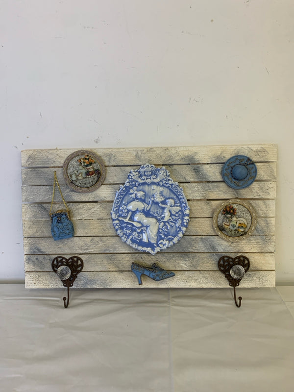 WOOD WALL HANGING W BLUE ACCENTS AND 2 HOOKS.