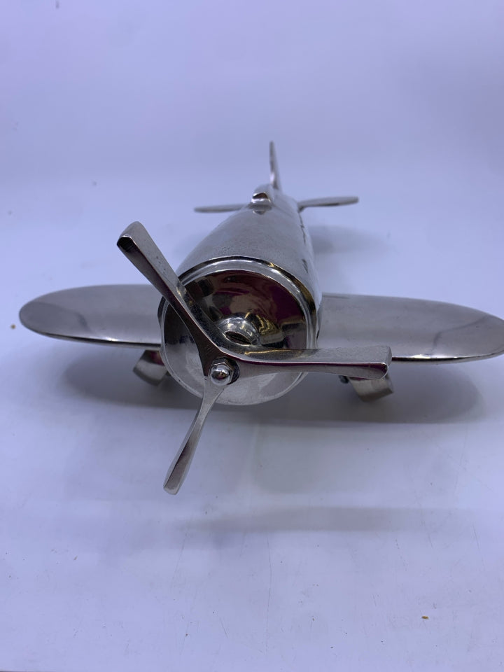 FOOTED MATTE SILVER METAL AIRPLANE W/ 3 PROPELLERS.