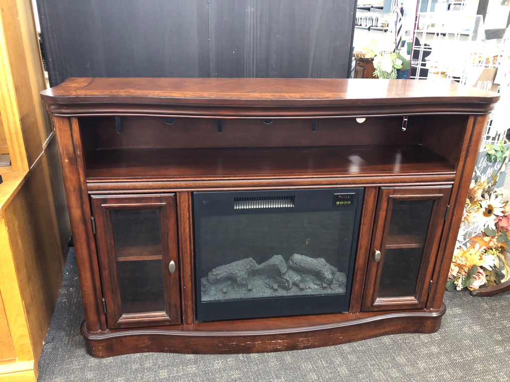 DK WOOD MEDIA CABINET W/FAUX ELECTRIC FIREPLACE.