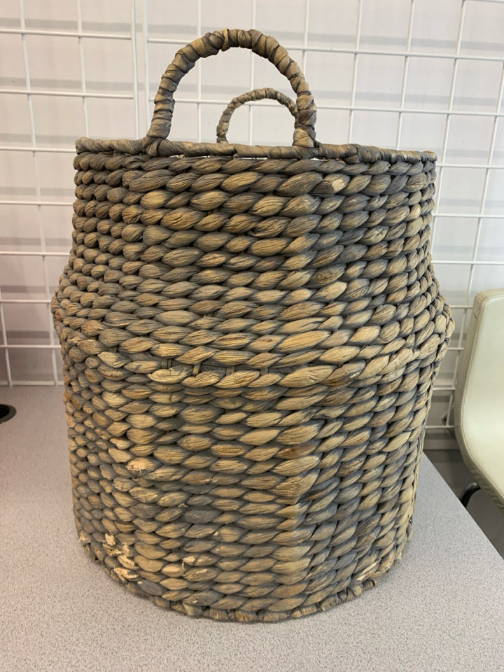 GRAY AND BEIGE WICKER BASKET.