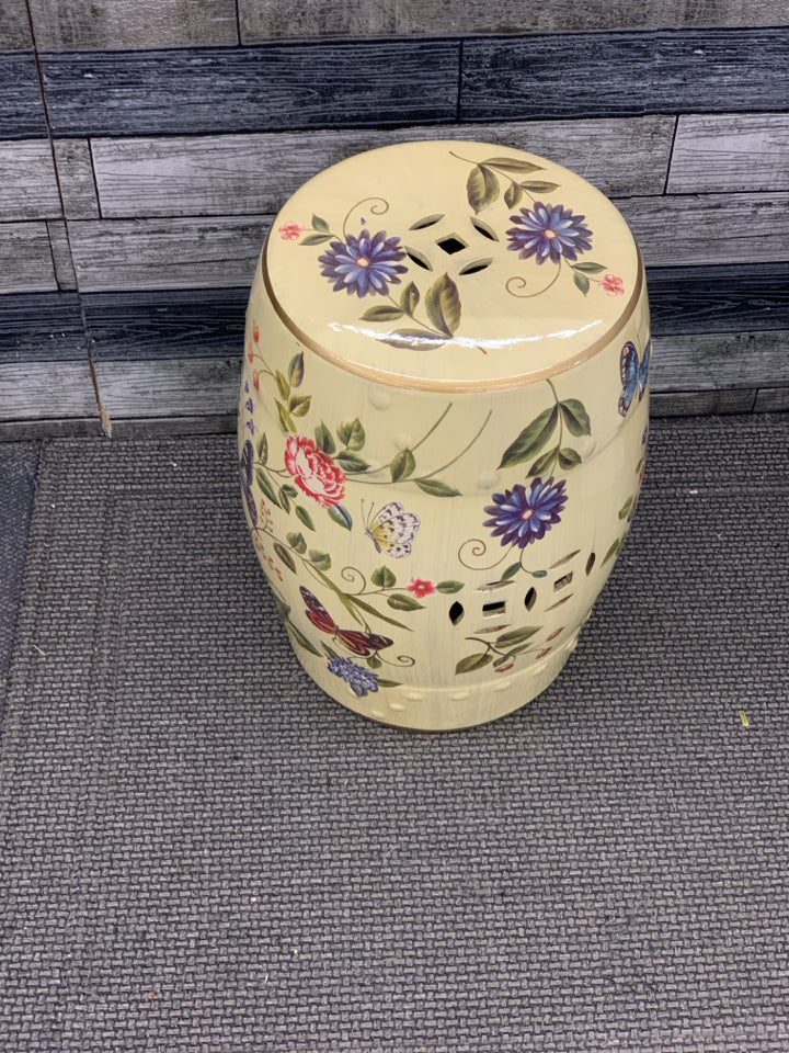 FLOWER PAINTED YELLOW CERAMIC GARDEN STOOL.