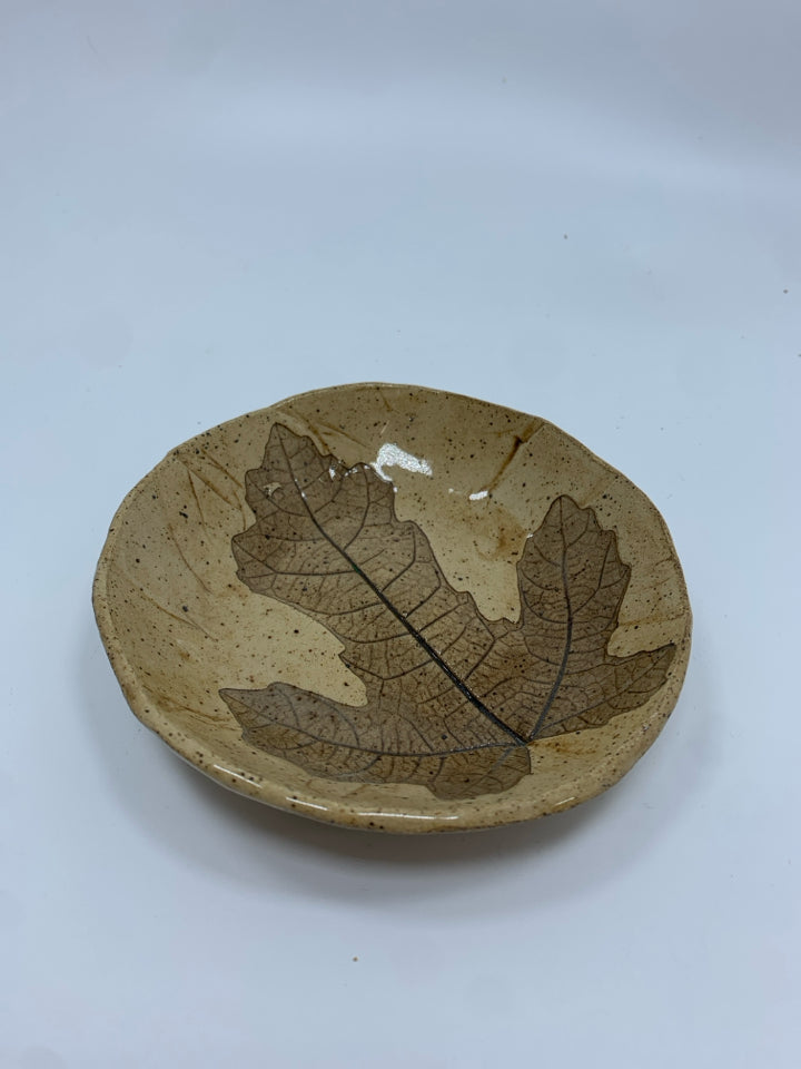 LEAF EMBOSSED POTTERY PLATE.