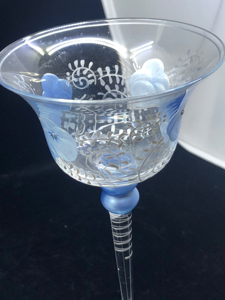 TALL GLASS VOTIVE CANDLE HOLDER BLUE FLORAL AND BLUE BASE.