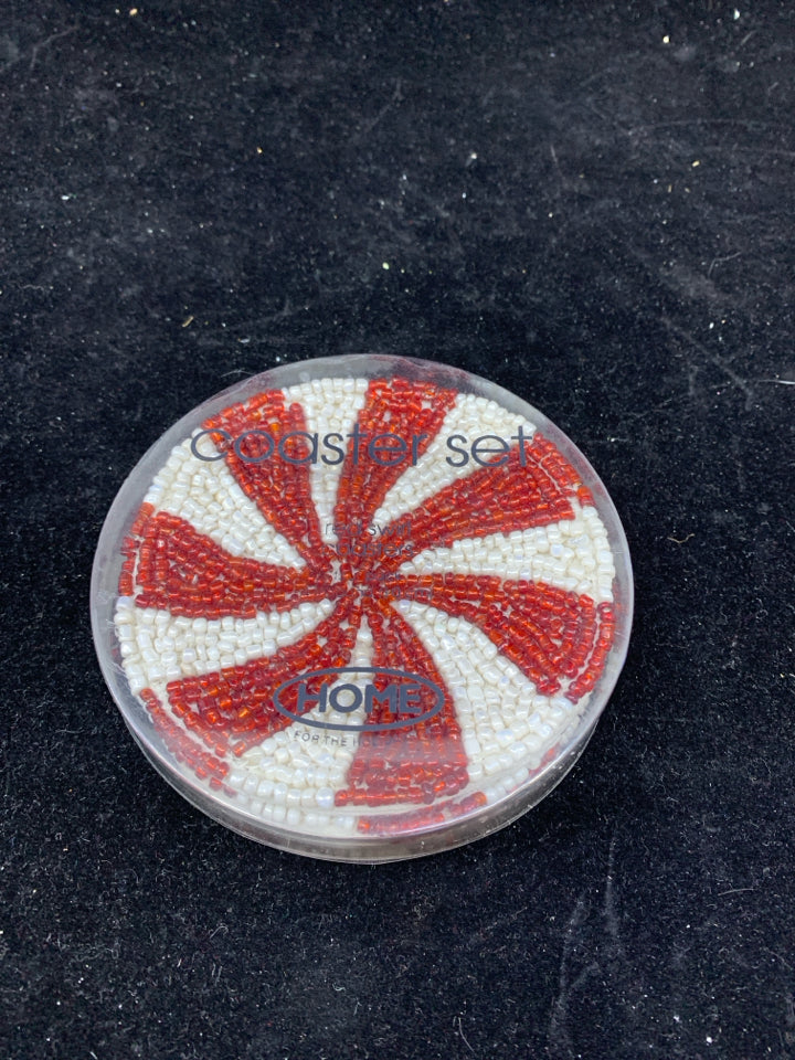 4 NIP RED SWIRL BEADED COASTERS.