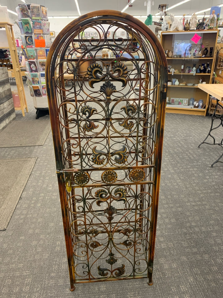 RUSTIC METAL FLOOR WINE RACK.