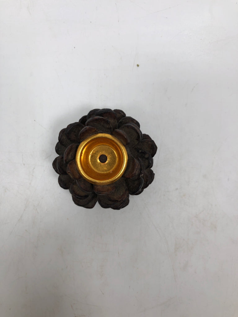 PINECONE TAPER CANDLE HOLDER.