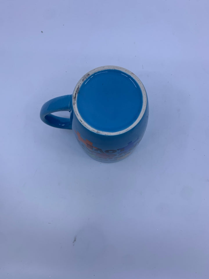 BLUE SUPPORT PUZZLE PIECES MUG.