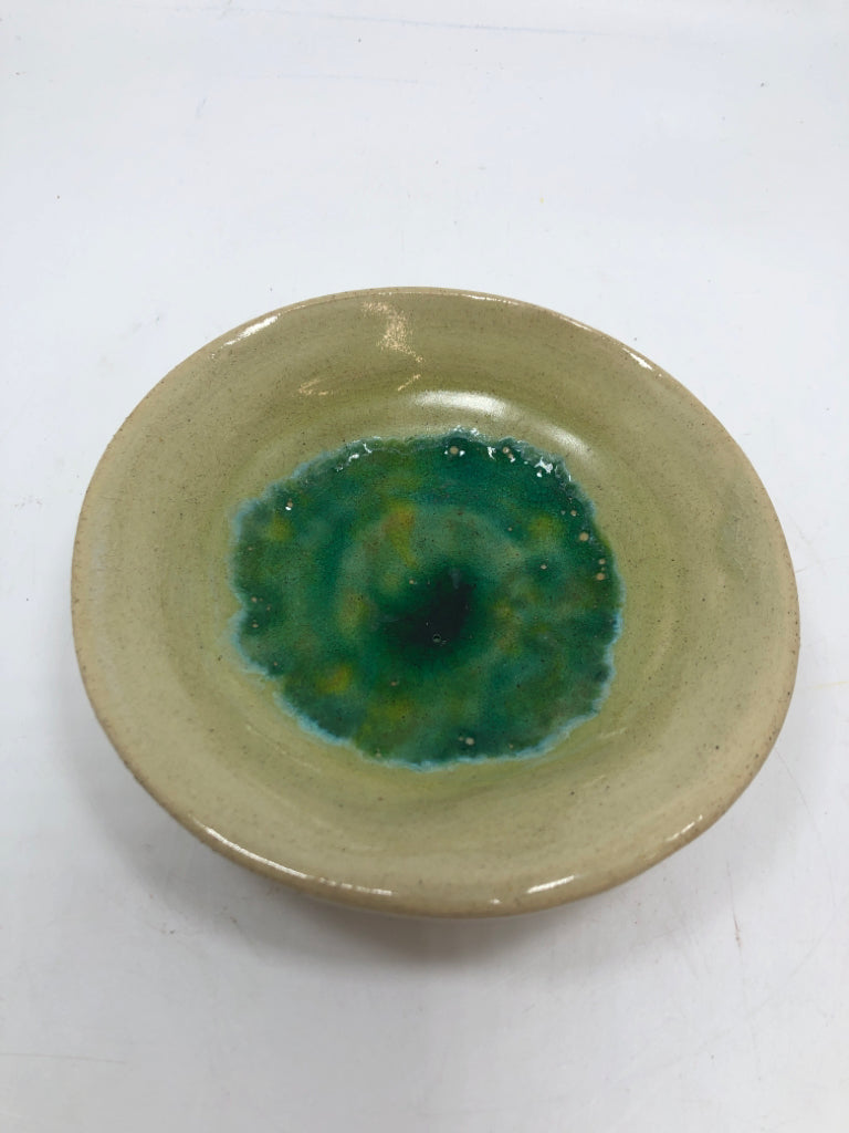 TAN AND GREEN GLAZE POTTERY DISH.
