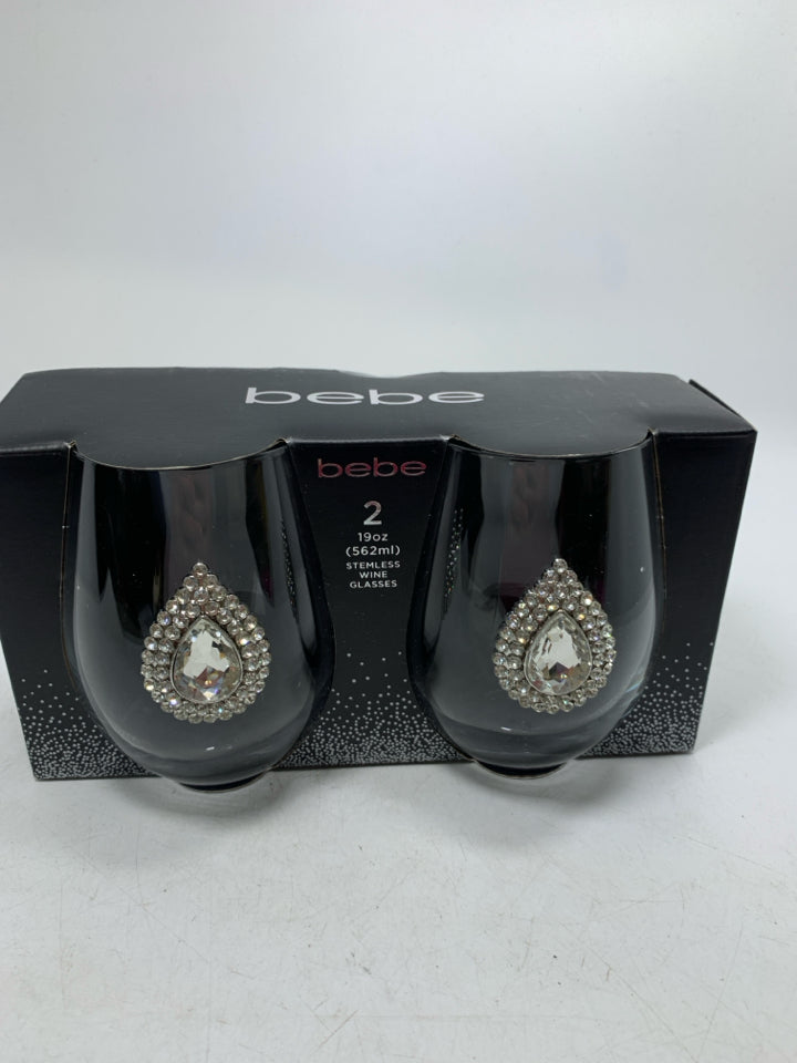 NIP 2 BEBE STEMLESS JEWELED CENTER WINE GLASSES.