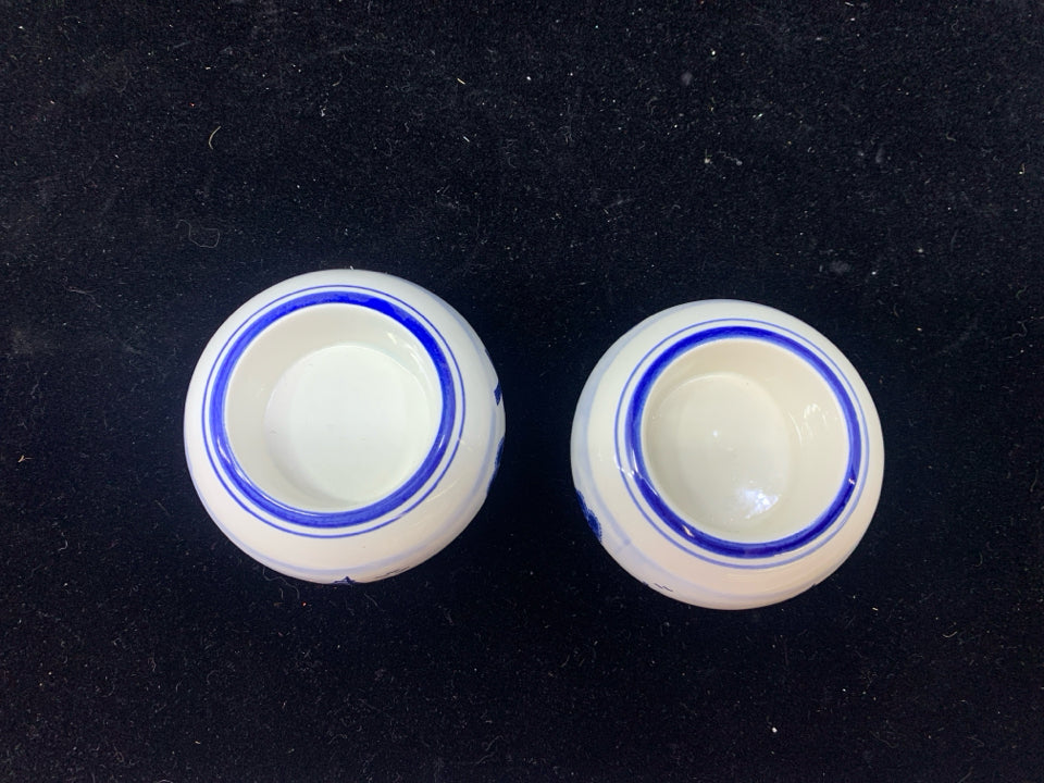 2 ROUND BLUE/WHITE WINDMILL TEA LIGHT HOLDERS.