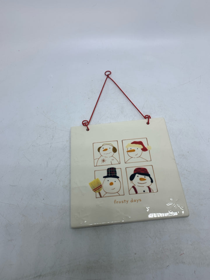 CERAMIC WALL PLAQUE W/ 4 DIFFERENT SNOWMAN HALLMARK.