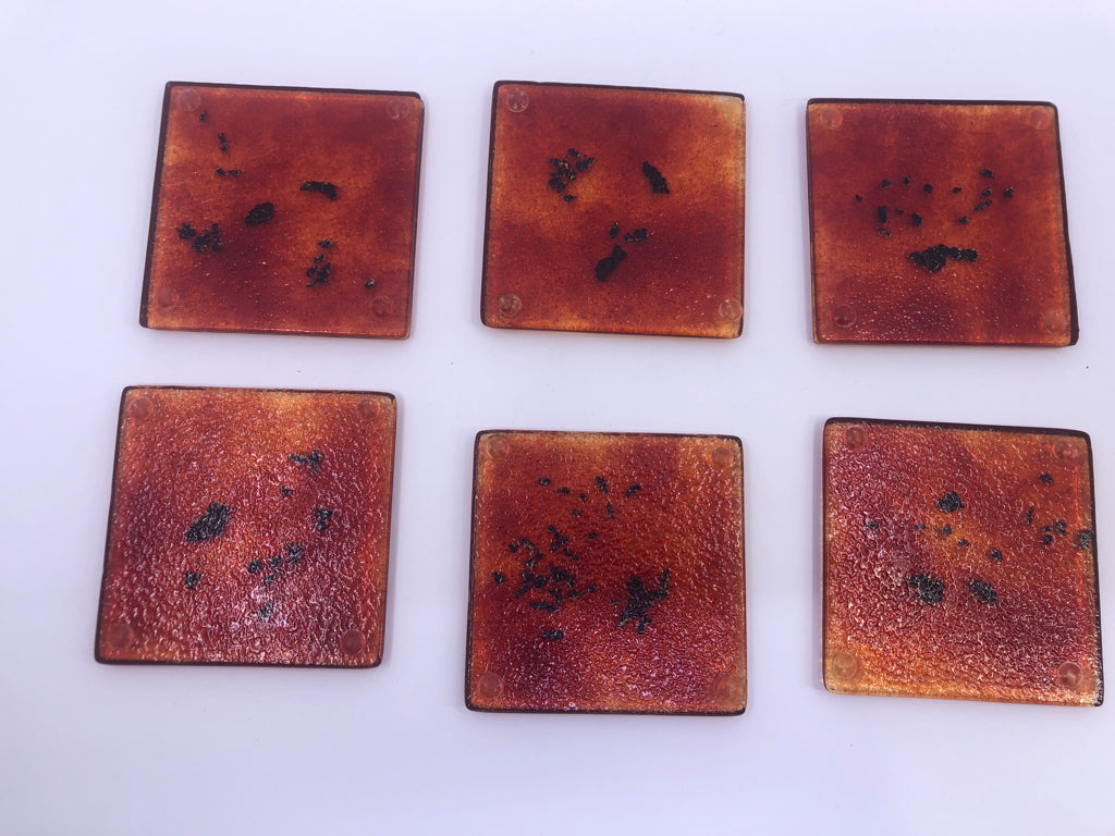 6 RED BLOWN GLASS COASTERS.